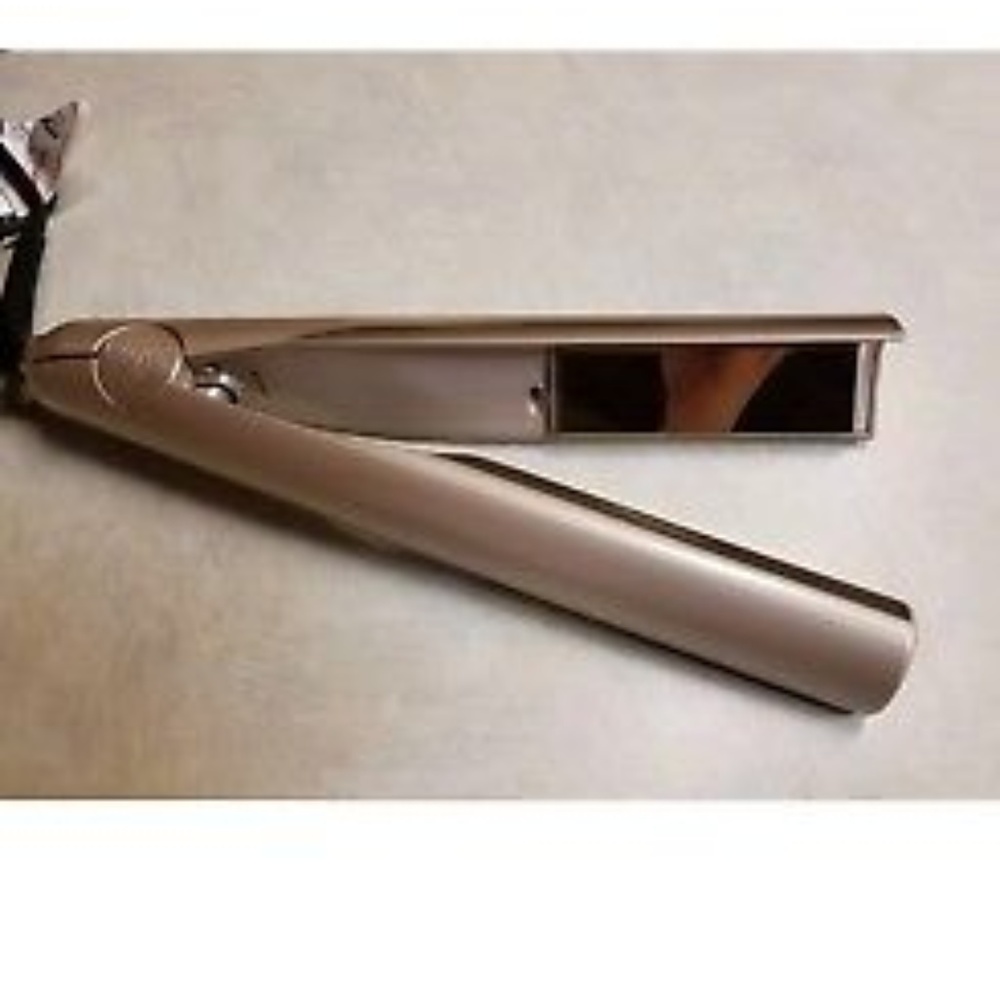 TYME styler.  European plug with US adapter.